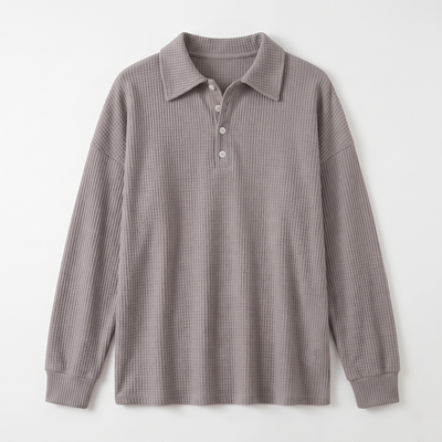 Grey waffle-knit sweater flat lay