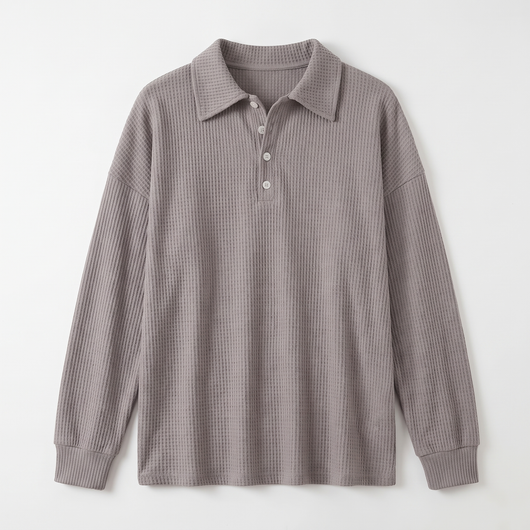 Grey waffle-knit sweater flat lay
