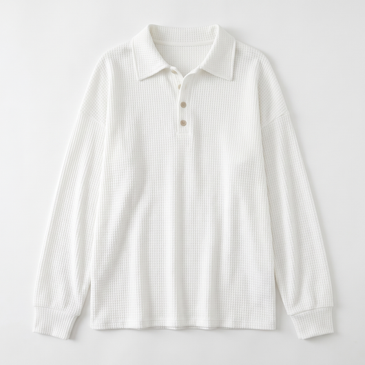 White waffle-knit sweater flat lay